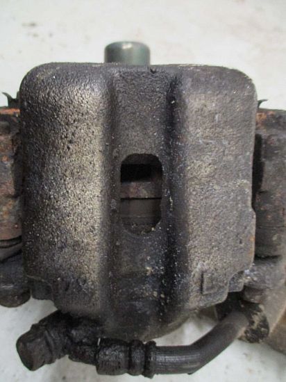 Brake caliper - ventilated front left SUZUKI GRAND VITARA I (FT, HT)