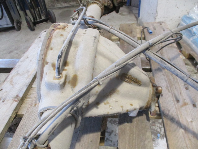 Rear axle beam with reducer