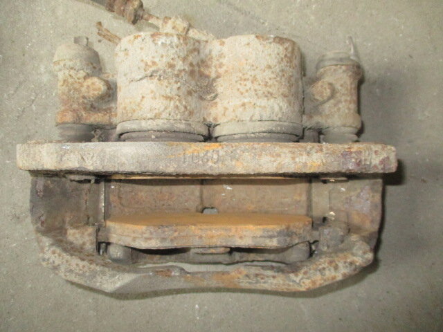 Brake caliper - front right NISSAN CABSTAR (F23, H41, H42)