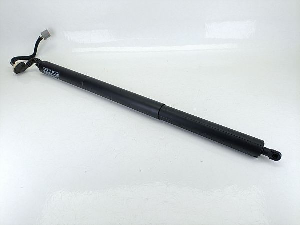 Soft-close tailgate actuator