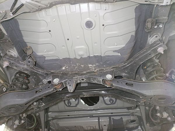 Rear axle beam with reducer