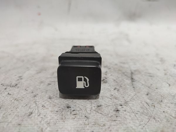 Bouton interrupteur de trappe à essence