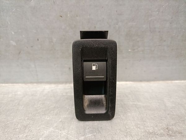 Bouton interrupteur de trappe à essence