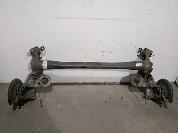 Rear axle beam with reducer