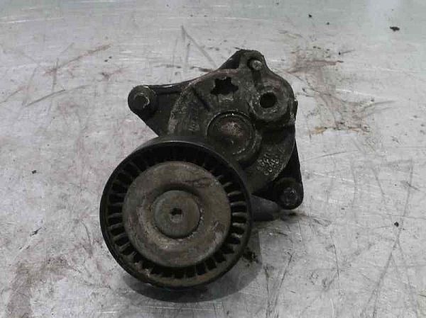Alternator belt tensioner