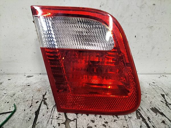 Tail light bulb cover holder