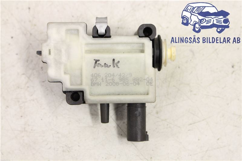 Fuel tank cap lock motor