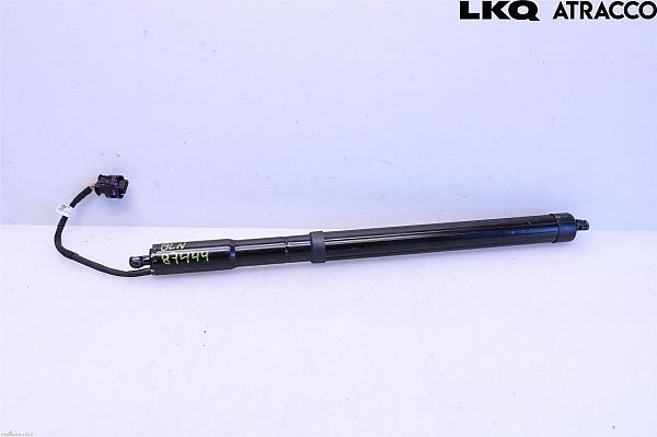 Soft-close tailgate actuator