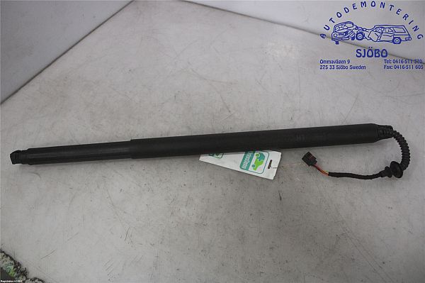 Soft-close tailgate actuator
