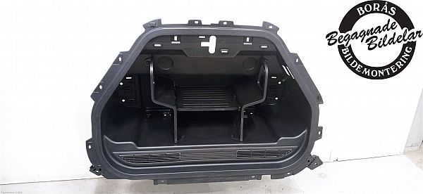 Front trunk storage compartment