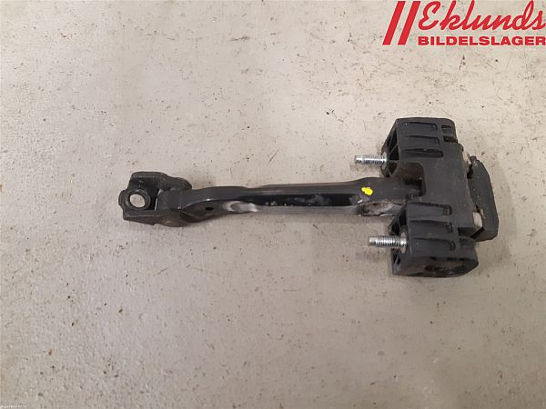 Door check strap stopper