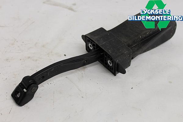 Door check strap stopper