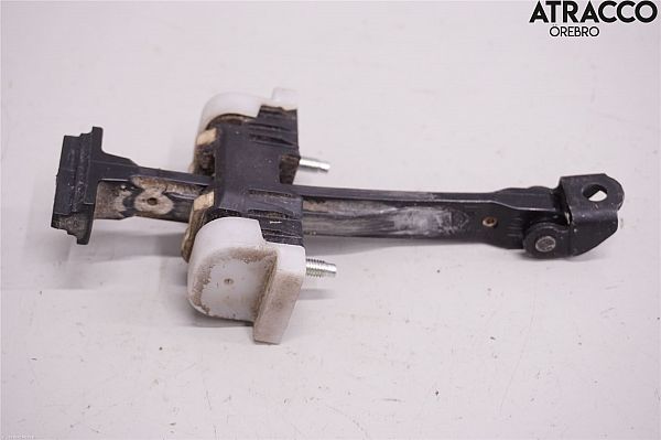 Door check strap stopper