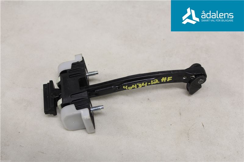 Door check strap stopper