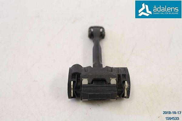 Door check strap stopper