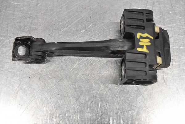 Door check strap stopper