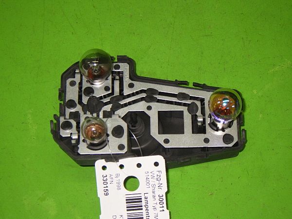 Tail light bulb cover holder