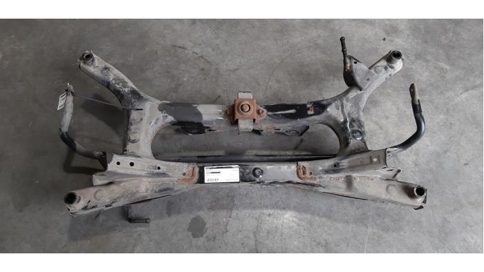 Rear axle beam with reducer