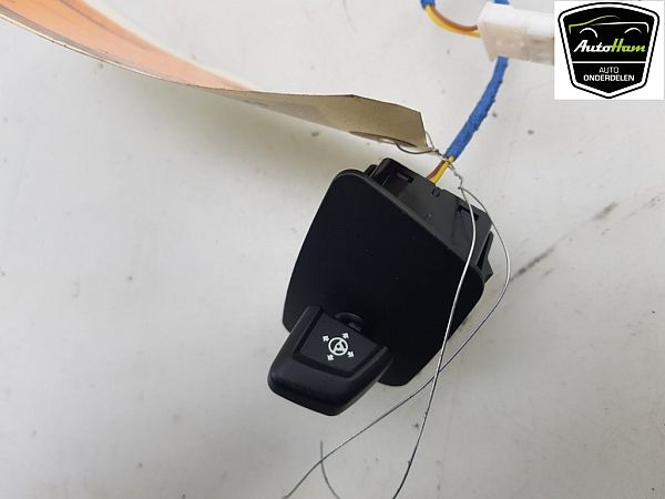 Steering wheel adjustment switch