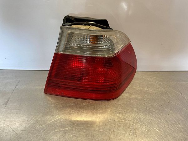 Tail light bulb cover holder