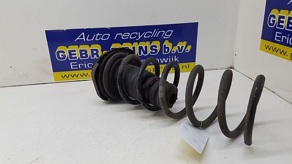 Support en caoutchouc pour ressort hélicoïdal