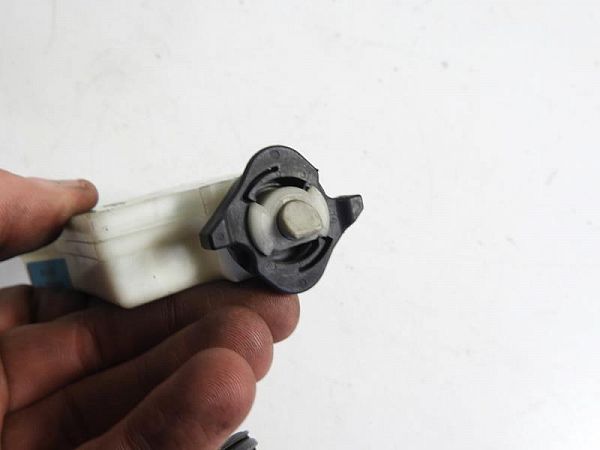 Fuel tank cap lock
